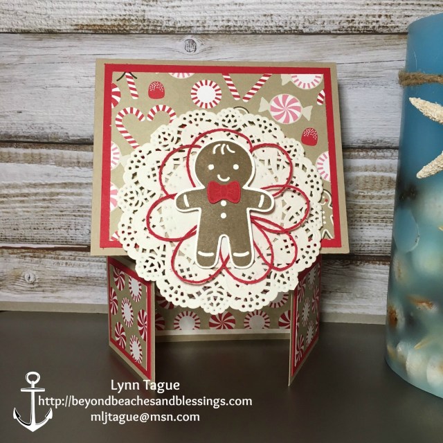 StampinUp Double Dutch Fold Christmas Card made with Cookie Cutter Christmas stamp set, Layering Circles Framelits, Candy Cane Lane DSP, Delicate White Doilies designed by demo Lynn Tague. See more cards and gift ideas at BeyondBeachesandBlessings.com #BeyondBeachesandBlessings