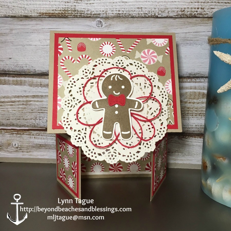 StampinUp Double Dutch Fold Christmas Card made with Cookie Cutter Christmas stamp set, Layering Circles Framelits, Candy Cane Lane DSP, Delicate White Doilies designed by demo Lynn Tague. See more cards and gift ideas at BeyondBeachesandBlessings.com #BeyondBeachesandBlessings